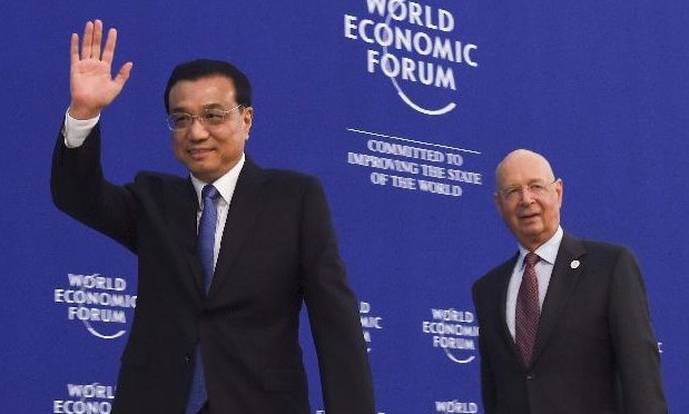 Chinese premier reassures world CEOs of growth
